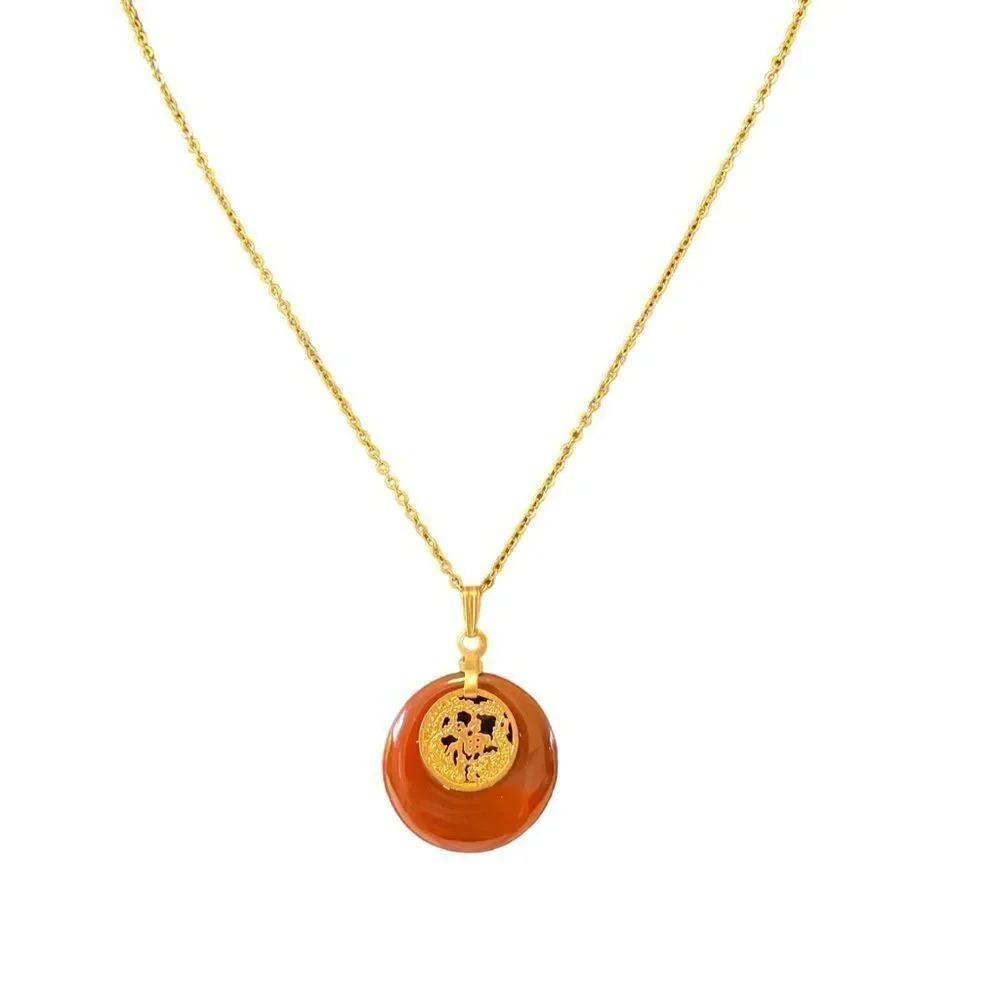 Delicate Looking Vintage Pendant on Shimmering Gold Tone Chain.